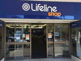 The Lifeline Corrimal Shop seen from the street, with the Lifeline Shop sign above the entrance