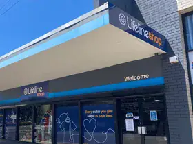 The Lifeline Wollongong Shop seen from the street, with the Lifeline Shop sign above the entrance